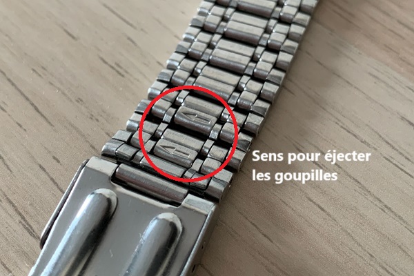 comment regler bracelet montre acier maillons goupilles sens